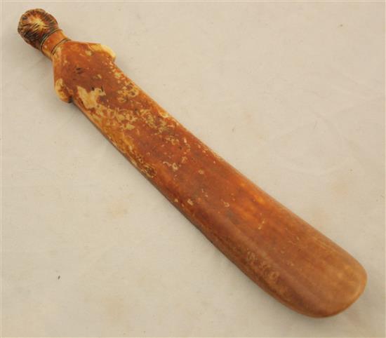 An early 19th century ivory shoe horn, 6.25in.